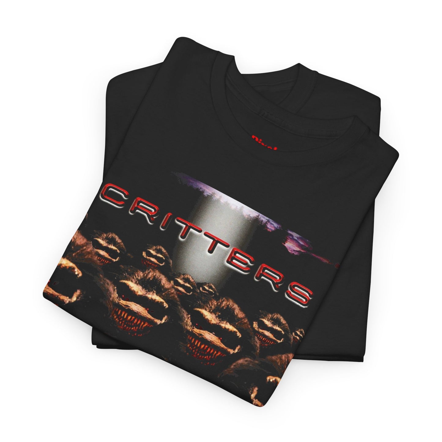 Folded black t-shirt with 'CRITTERS' graphic design on a white background, Critters 80s horror sci-fi cult classic graphic t-shirt, unisex heavy-cotton